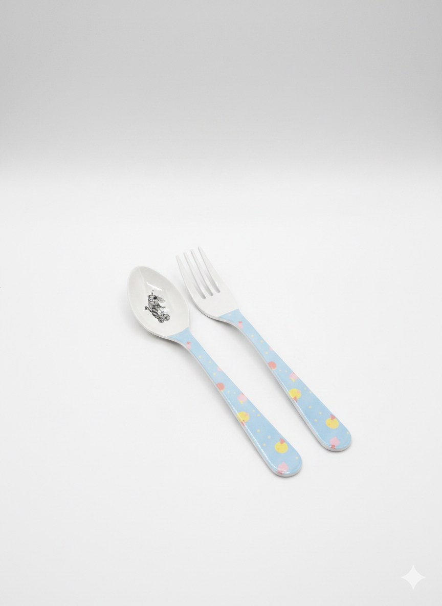 Children's spoon and fork set with blue handles on a white background